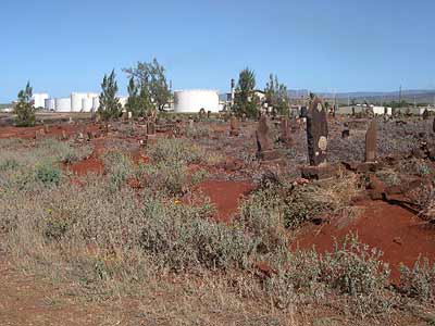 (Cemetery and oil tanks)